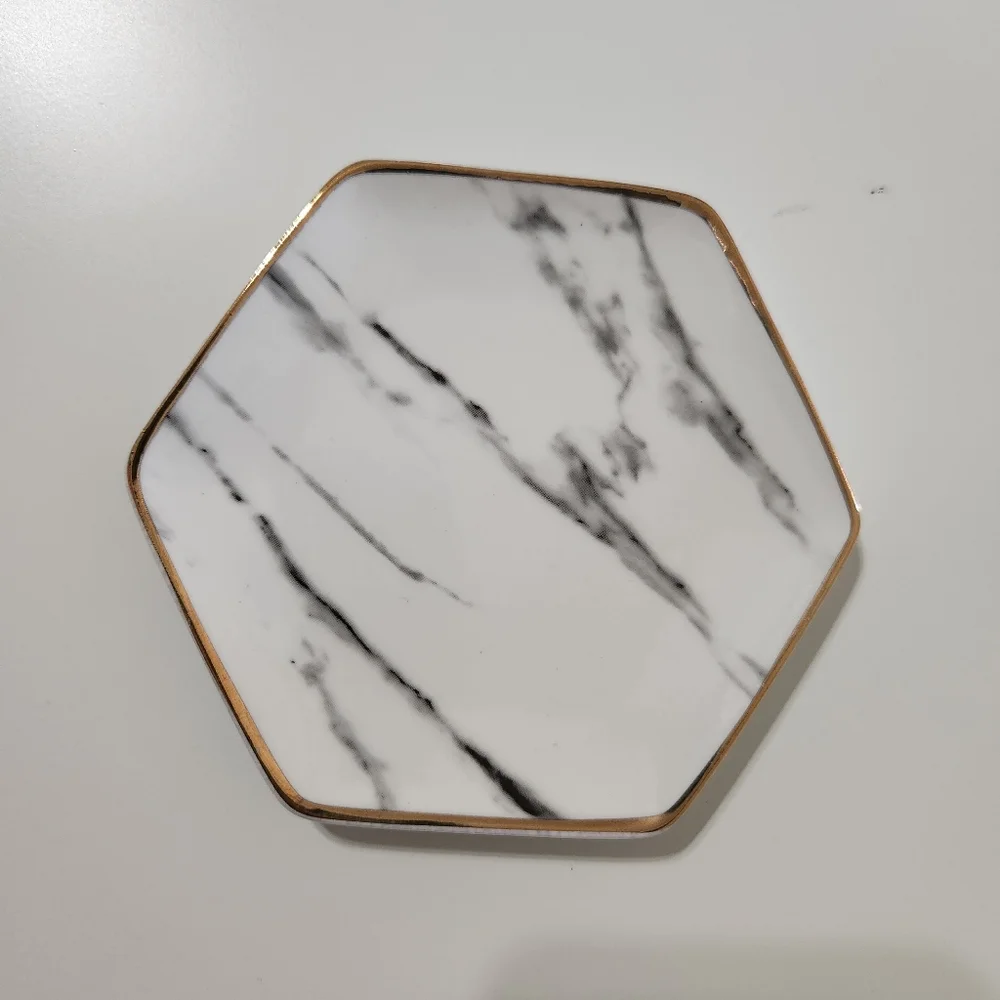 Pier one marble ring dish with gold trim